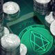 EOS-stacked-coins-with-green-background-of-EOS-logo.