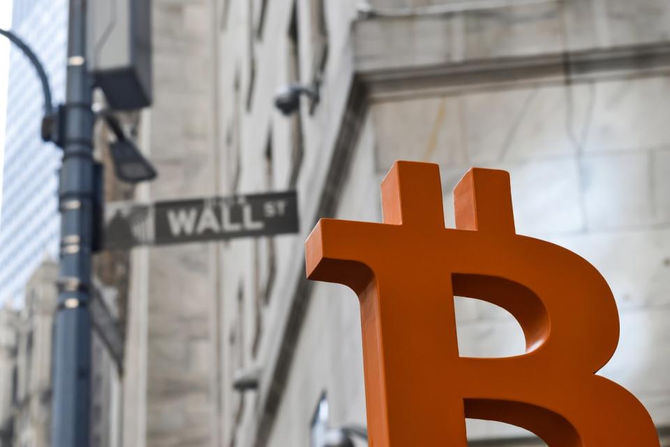 The Bitcoin logo on Wall Street.