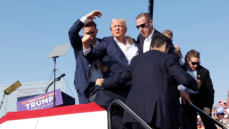 Donald Trump is kicked off stage at rally