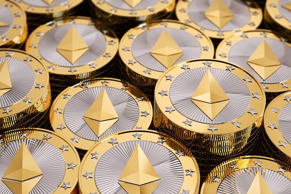 A stack of coins with the Ethereum logo.